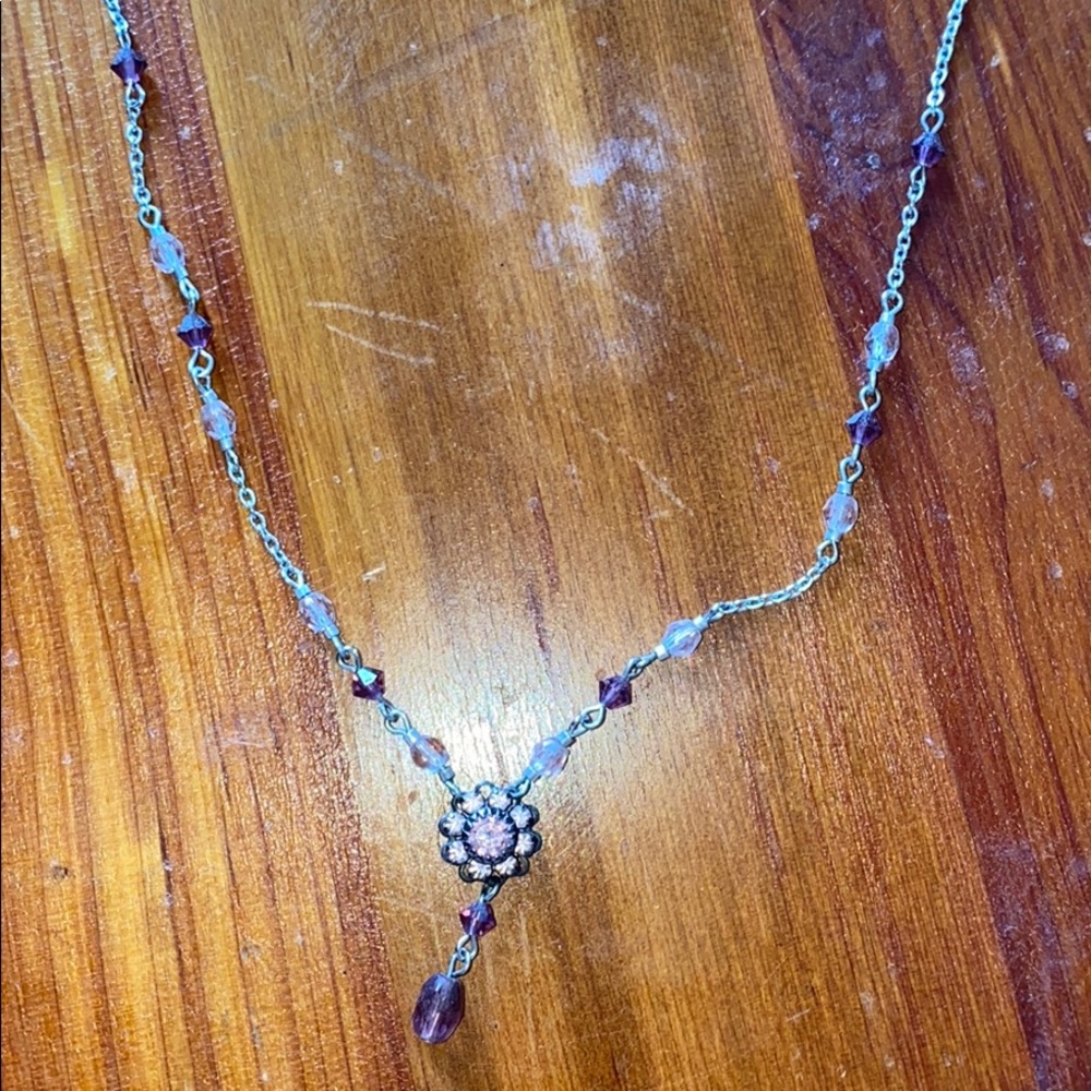 Delicate purple and pink piece of costume jewelry